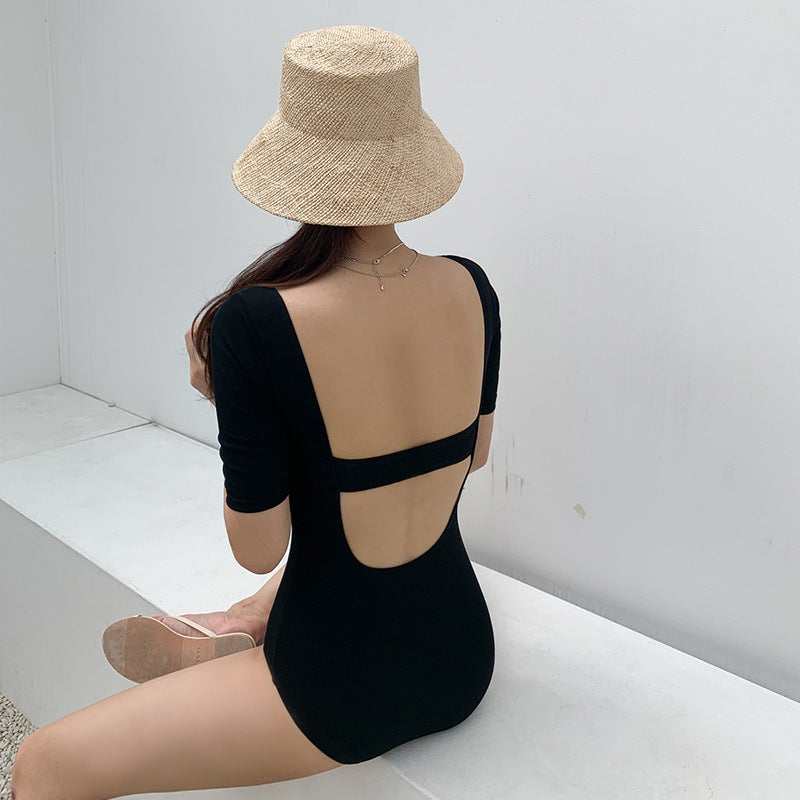 Strak massief zwempak uit één stuk voor minimalistische strandglam