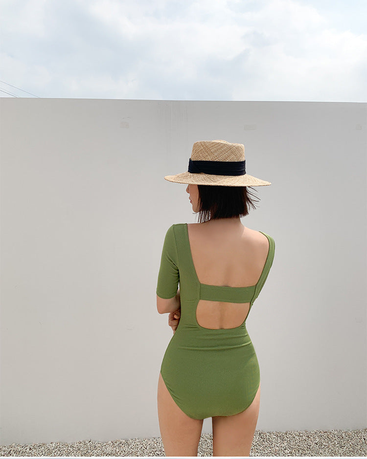 Strak massief zwempak uit één stuk voor minimalistische strandglam