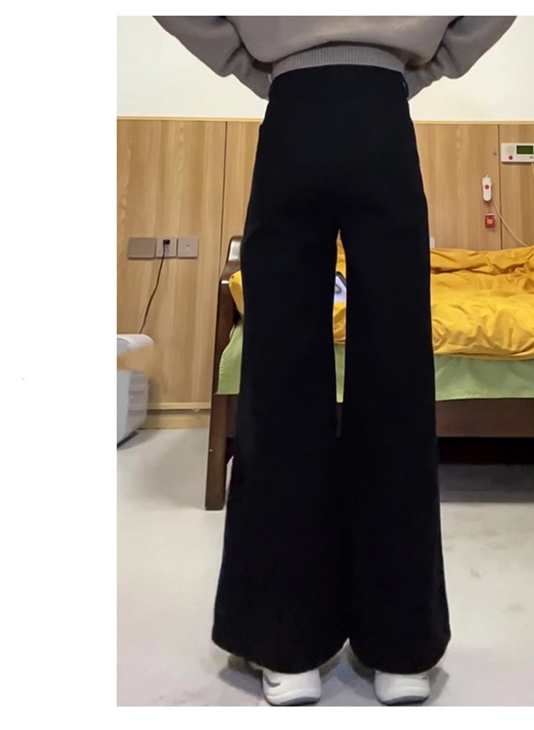 Warna solid longgar jeans kaki lebar dengan gaya minimalis