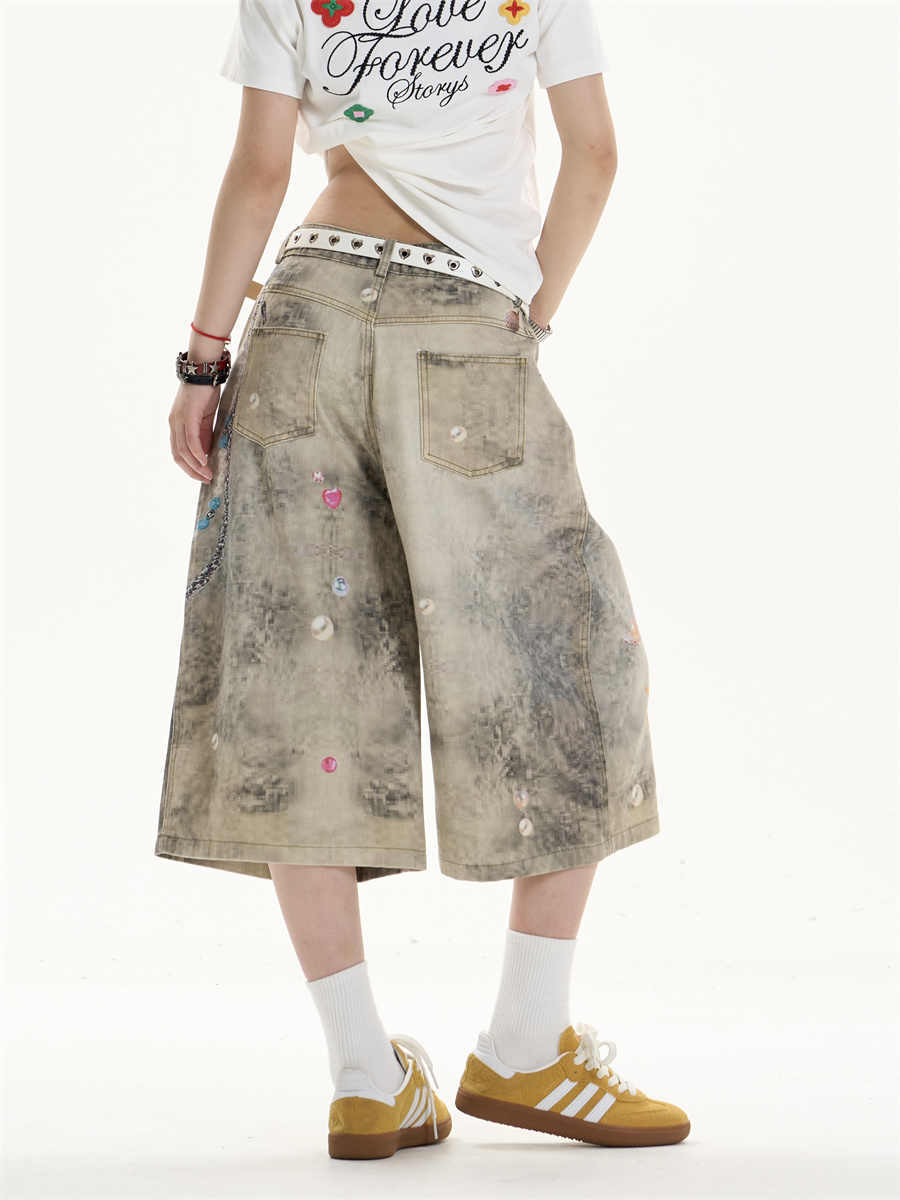 Jeans creativi a gamba a gamba con arte stampata Fiorisce