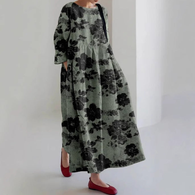 リラックスしたシルエットを備えた創造的な4分の3のフローラルドレス