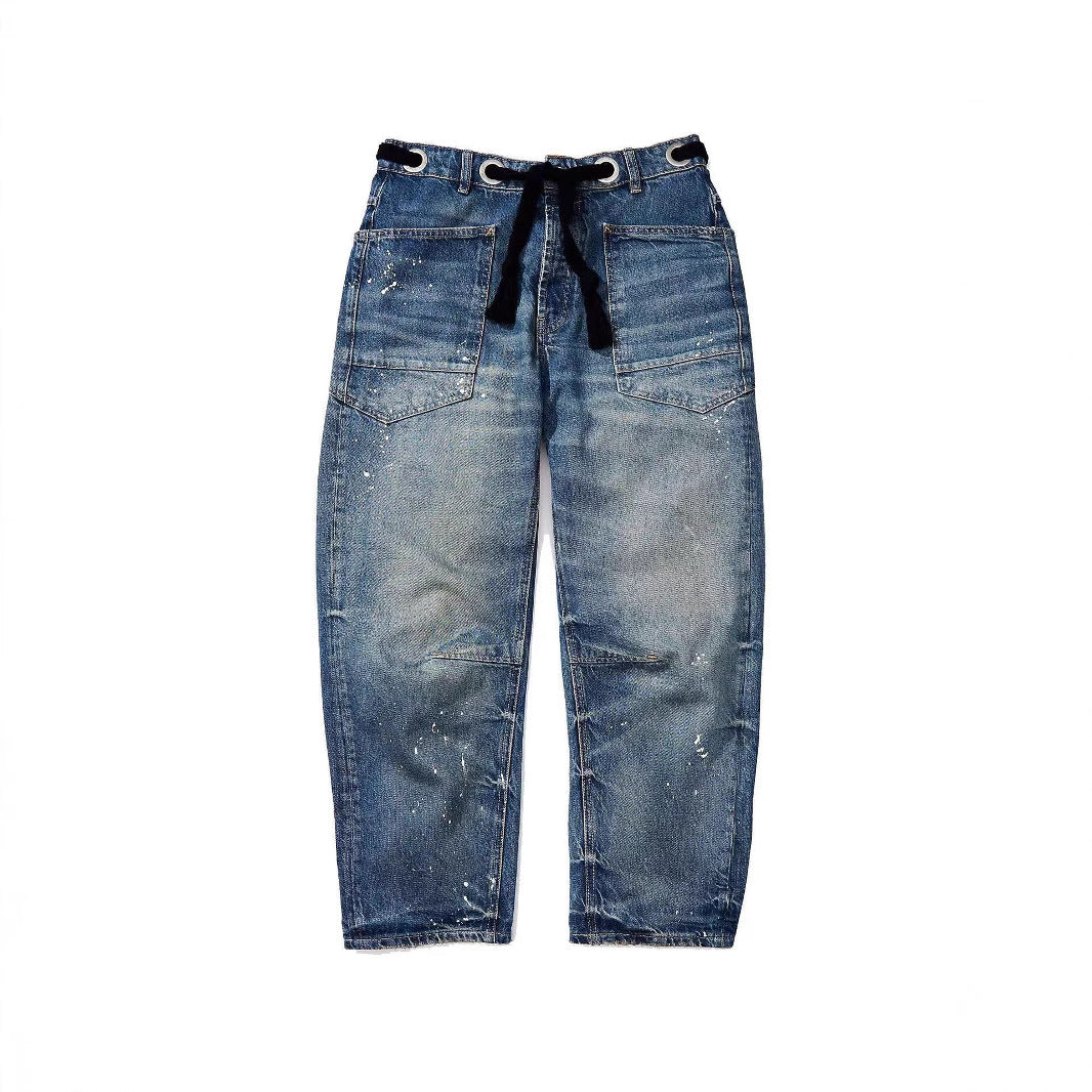 Jeans longgar longgar splash-tinta dengan twist kasual artistik