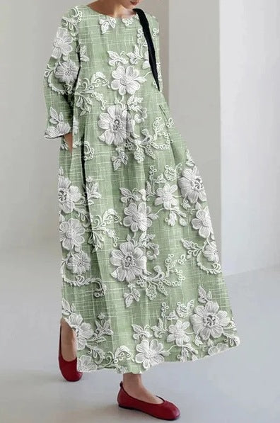 リラックスしたシルエットを備えた創造的な4分の3のフローラルドレス