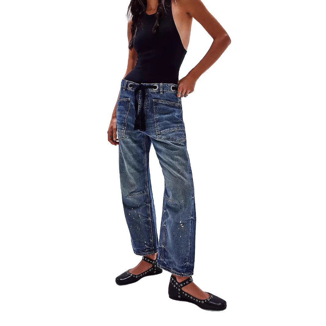 Jeans longgar longgar splash-tinta dengan twist kasual artistik