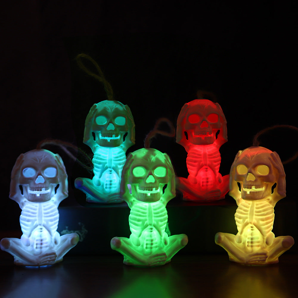 Light Up Skull in Yoga Pose Halloween Decoration in Multiple Colors