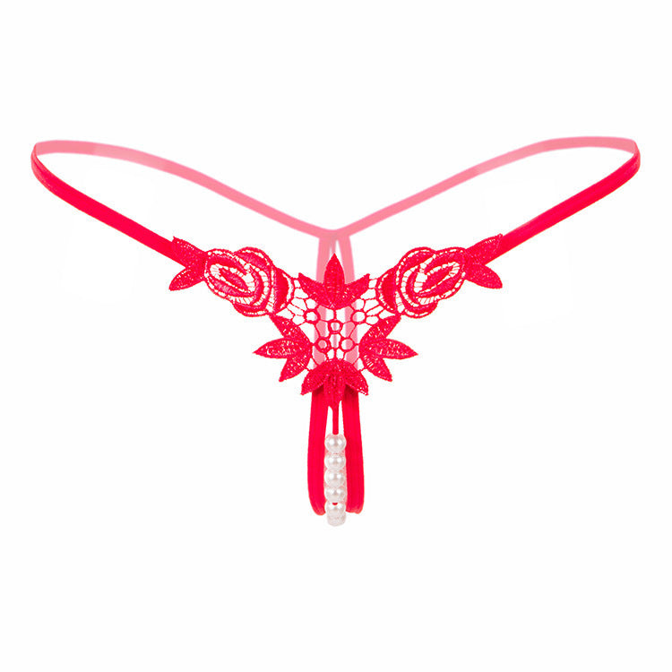 Panty de string en dentelle perle cachée