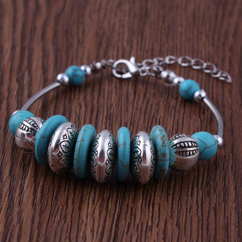 Turquoise and Metal Rings Bracelet