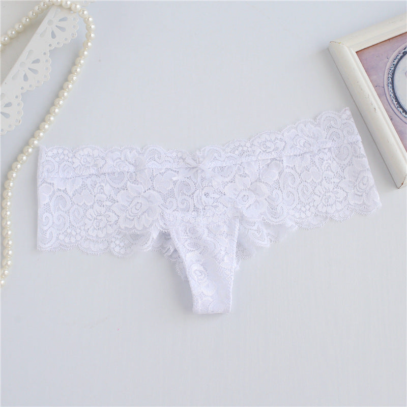 Panty de string de jupe large en dentelle florale