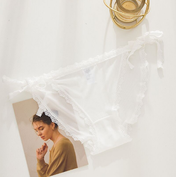 Calzoncillos de encaje elegante Ropa interior con pajarita en las caderas
