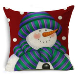 笑顔の雪だるまの休日の枕が覆われています